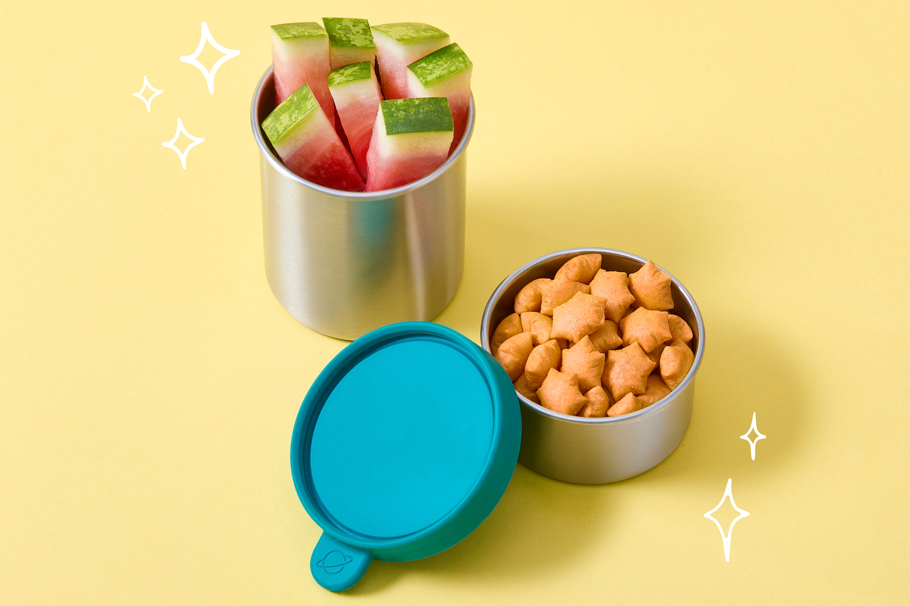 PlanetBox Daytripper on yellow background with purple craft paper cutout.