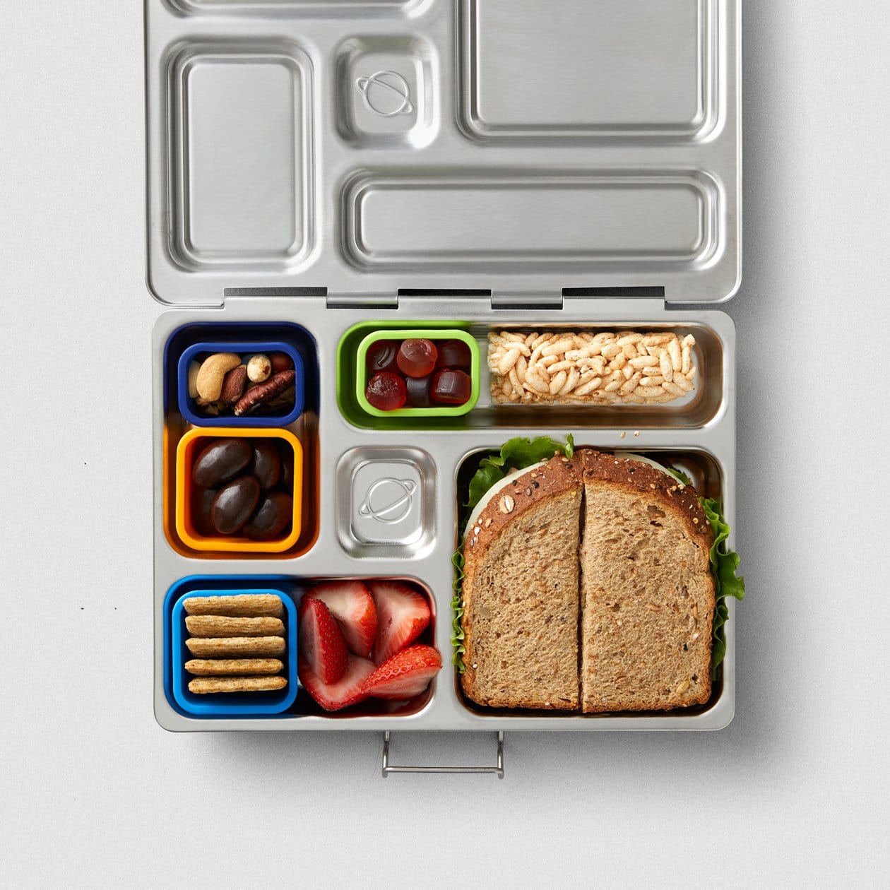 PlanetBox Rover lunchbox featuring Jungle color assortment of 4 pack pods.