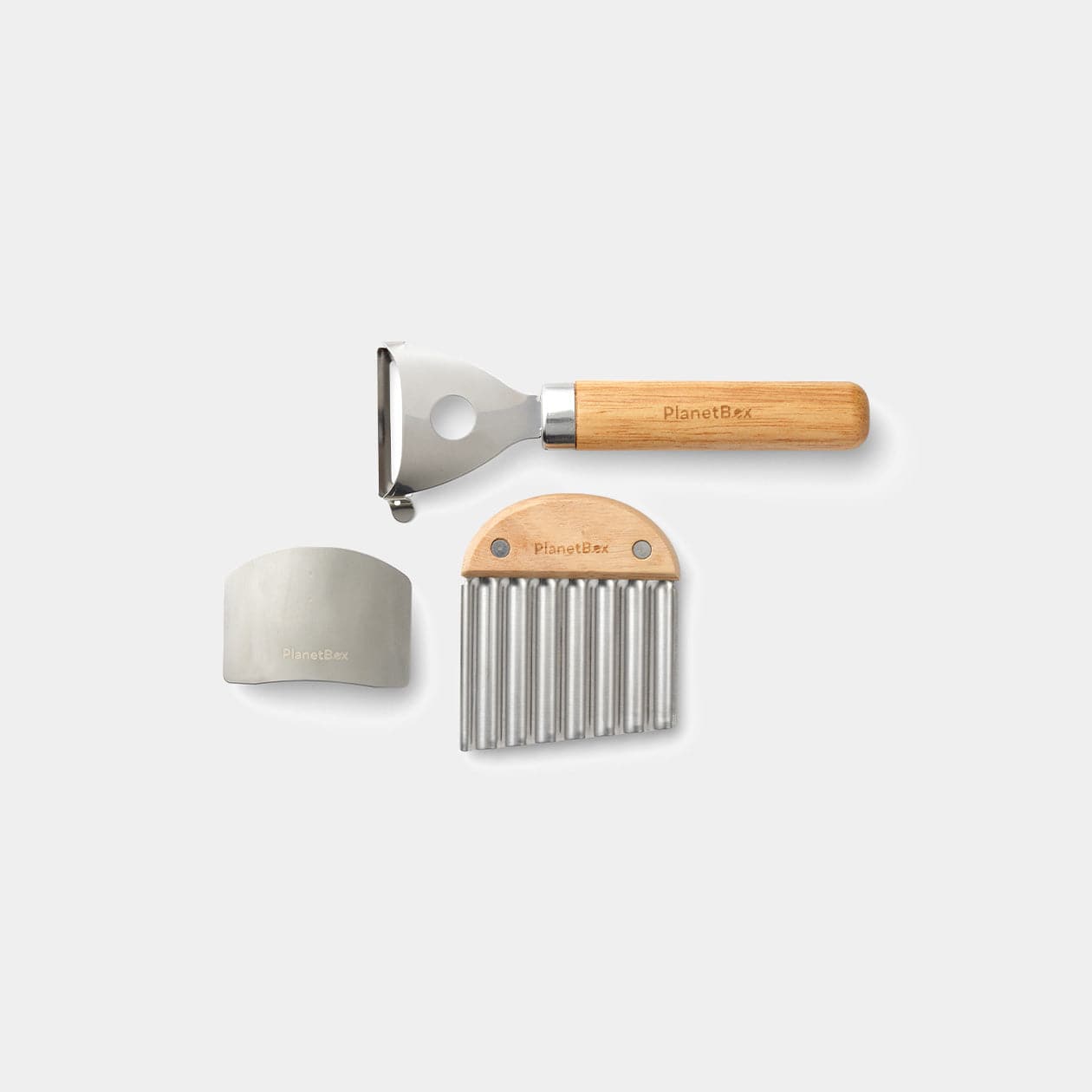 Front view of the prep to pack peeler, wavy chopper and finger guard.