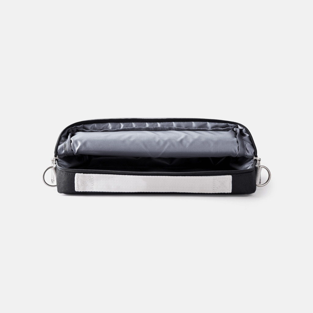 open view of black currant slim sleeve showing grey interior.