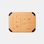 Back view of PlanetBox Prep to Pack cutting board on white background. 